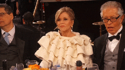 Jane's reaction to Jonah's schtick almost makes her dress forgivable... almost.